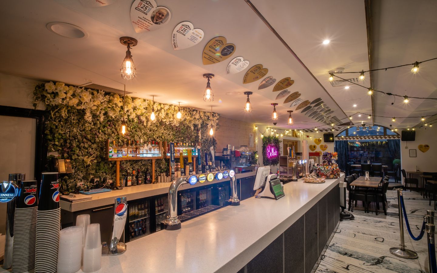The interior of an ambiently lit modern café
